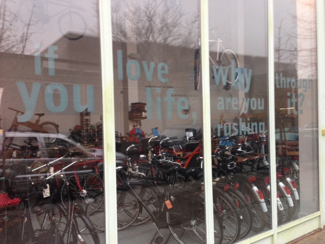 I walk past Rolling Orange bike shop on many of my grocery shopping ventures, and I love the sentiment in their window.