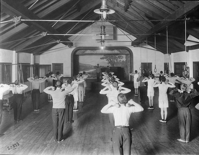 If you want to get in shape, you need to prioritize how you exercise. Here, boys exercise at Hiawatha Playfield, 1911, Seattle Municipal Archives. Photo used under Creative Commons license.