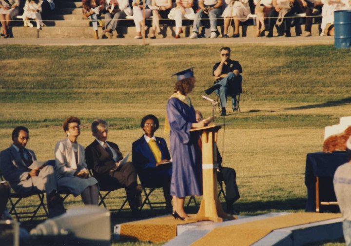 This is me giving one of the commencement speeches at Arthur Hill High School in 1988. I was very proud of that perm, as I was of the corny speech I wrote. Photo courtesy of Kristi McGarrity Robins