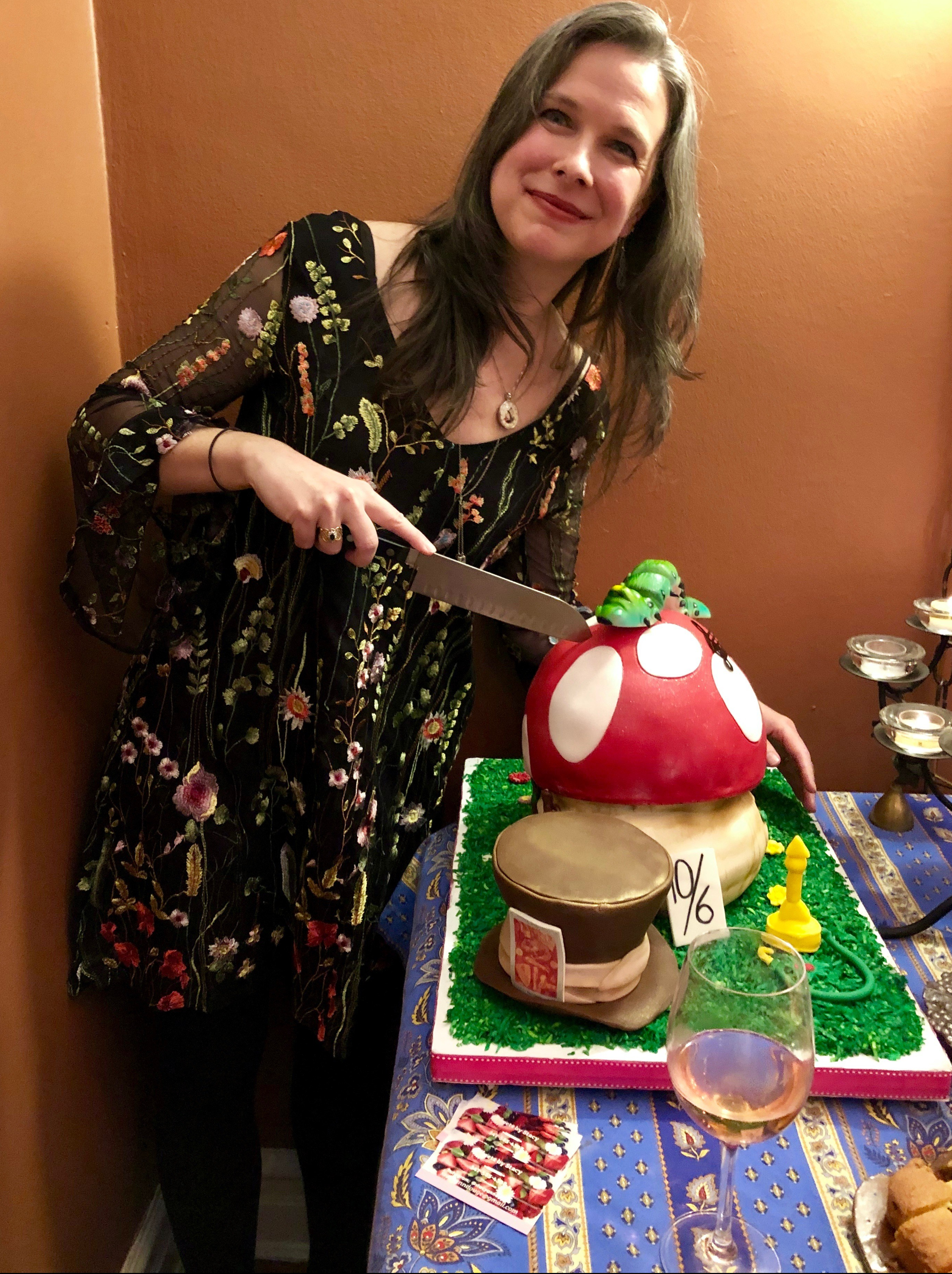 me with Alice in Wonderland birthday cake 2019